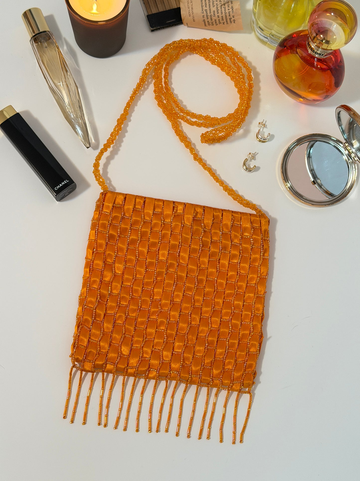 The Dyani - orange geometric beaded purse