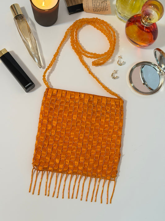 The Dyani - orange geometric beaded purse