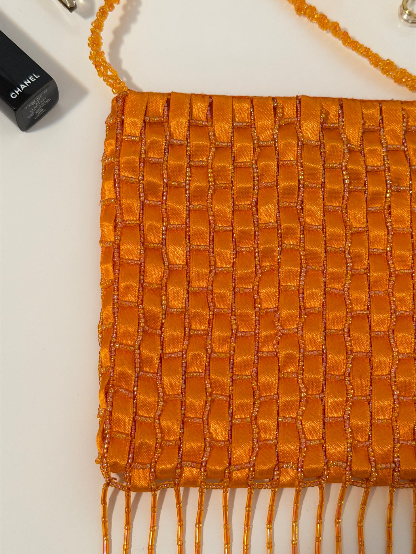 The Dyani - orange geometric beaded purse