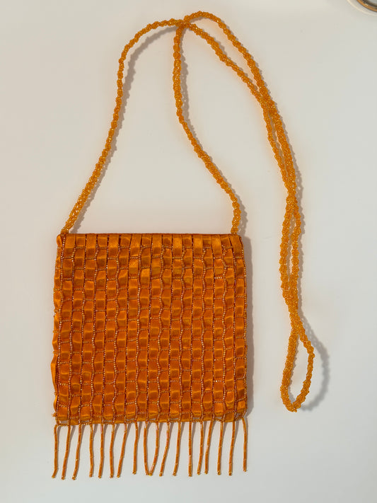 The Dyani - orange geometric beaded purse